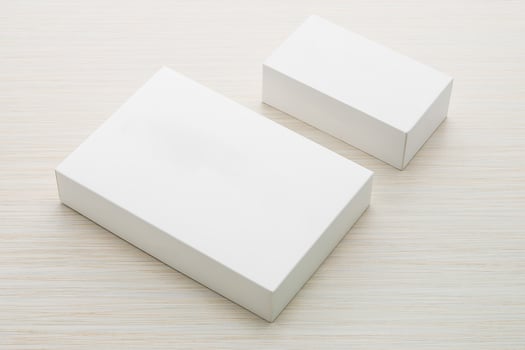White box on wooden surface photo
