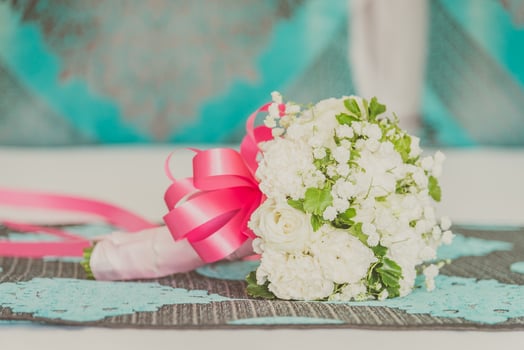 A bouquet of white flowers on a table photo