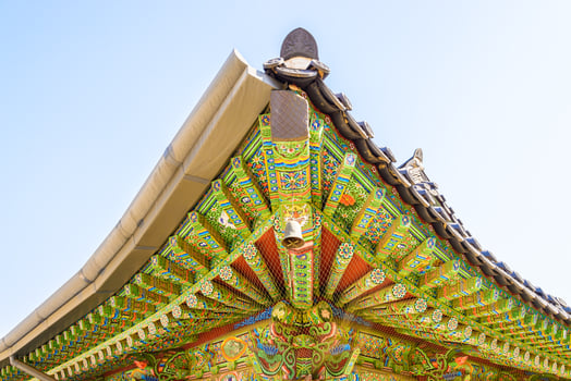 A colorful roof with a large statue of a horse photo