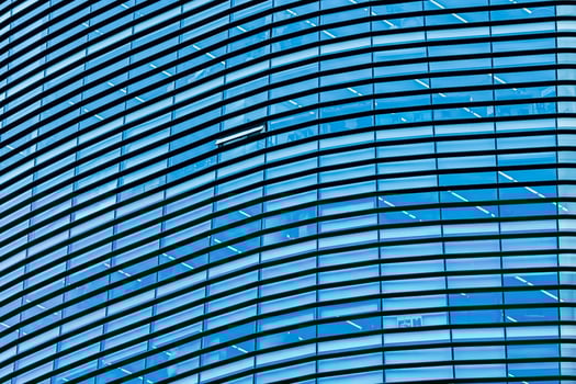 A blue building with many windows photo