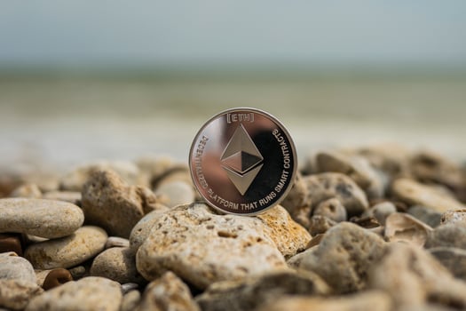 ethereum Cryptocurrency. e-currency. summer beach. sea stones photo