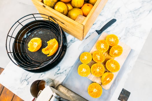 A wooden crate with oranges on it photo