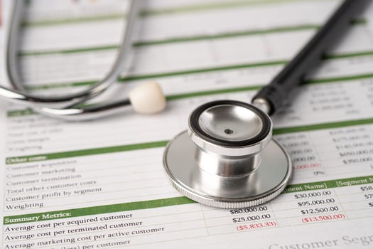 Stethoscope on spreadsheet paper, Finance, Account, Statistics, Investment, Analytic research data economy spreadsheet and Business photo
