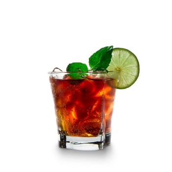 A glass of iced tea with a lime wedge photo