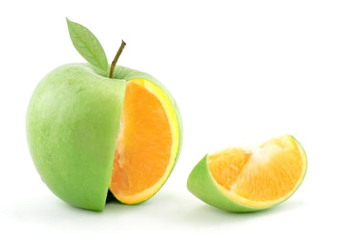 A green apple with a slice cut out of it photo