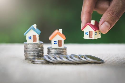 Investors hold houses.  Real estate,  Property investment and house  Mortgage concept. photo