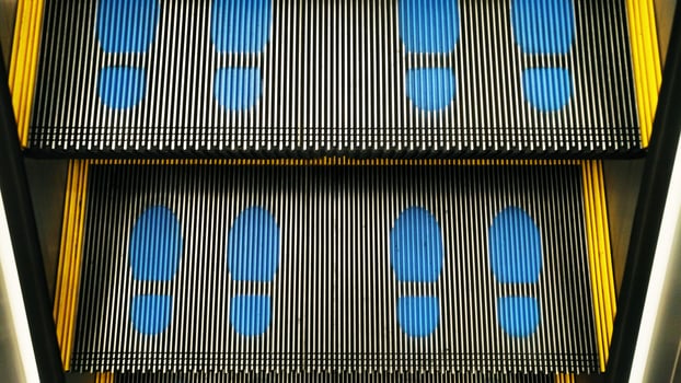 The escalator and foot print photo