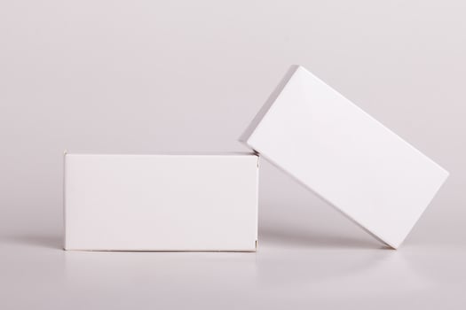 White pills box. Plastic bottles. Drugs box mock-up. Medical blank cardboard. Mockup. Pills bottle photo
