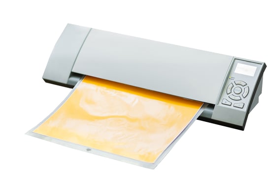 Cutting plotter. Paper cut machine for scrapbook isolated on white background. Craft equipment with sticky pad photo