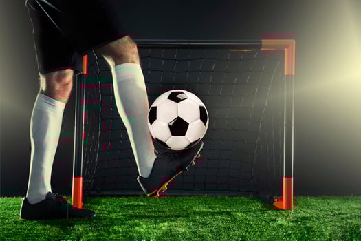 Football. Soccer. Soccer player dribbling with ball photo