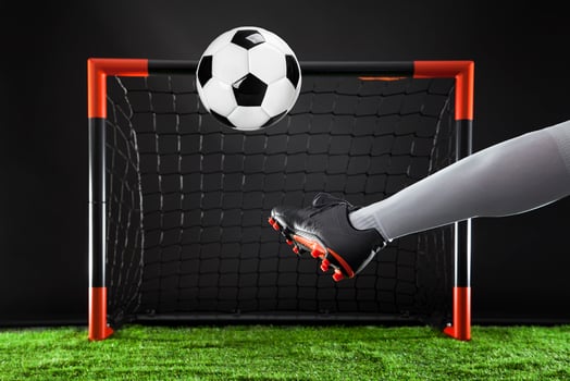 Football. Soccer. Soccer player dribbling with ball photo