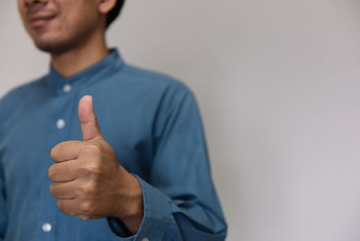 Young handsome man wearing light blue shirt  with different behaviors at work photo