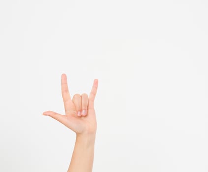 Hand making the heavy metal isolated white background. afro american hand. Mock up. Copy space. Template. Blank. photo