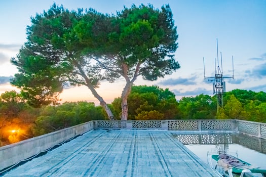 Sunset at roof terrace with a sun lounger in Mallorca. photo