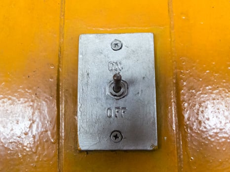 Switch off and on. On the old yellow wood floor. photo