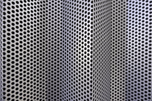 Metal wall with holes photo