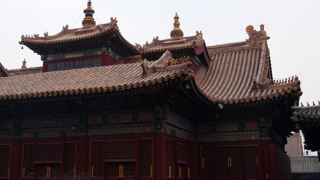 Traditional Chinese temple architecture, ancient house facade with ornamental roof photo