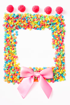 Colorful frame candy, lollipop and sweets isolated on white background. Sweet food. Top view. Selective focus. photo