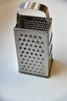 Stainless Steel Vegetable Grater Close-up photo