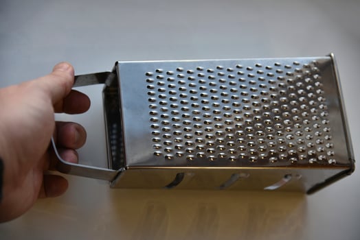 Stainless Steel Vegetable Grater Close-up photo
