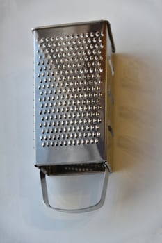 Stainless Steel Vegetable Grater Close-up photo