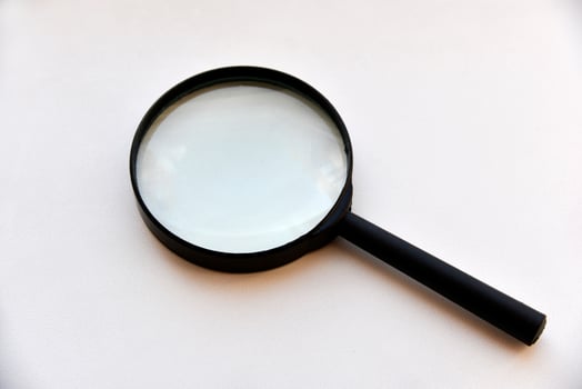 Large magnifying magnifier on a white background photo