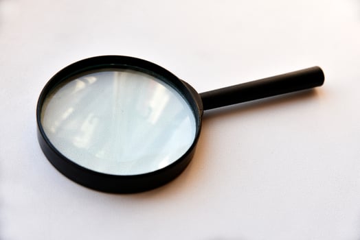 Large magnifying magnifier on a white background photo