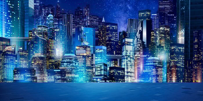 building at night cty background photo