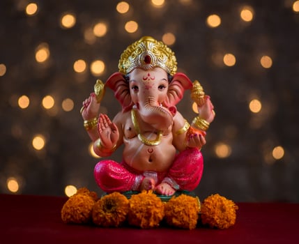 Hindu God Ganesha on Blured bokeh background, Ganesha Idol. photo
