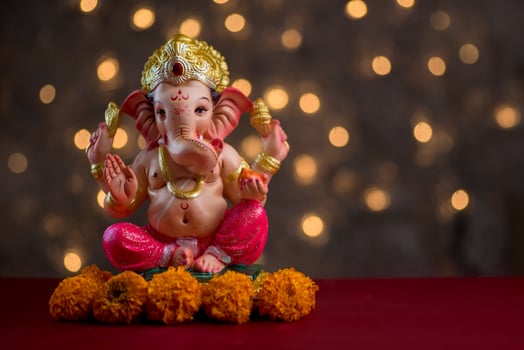 Hindu God Ganesha on Blured bokeh background, Ganesha Idol. photo
