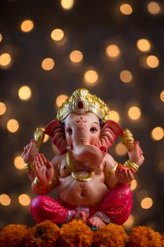 Hindu God Ganesha on Blured bokeh background, Ganesha Idol. photo