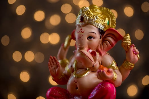 Hindu God Ganesha on Blured bokeh background, Ganesha Idol. photo