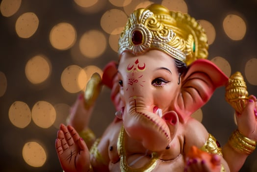 Hindu God Ganesha on Blured bokeh background, Ganesha Idol. photo