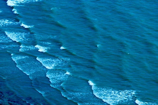 Texture. Blue waves in canal at Thailand. photo