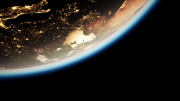 Space, Sun and planet Earth at Night photo