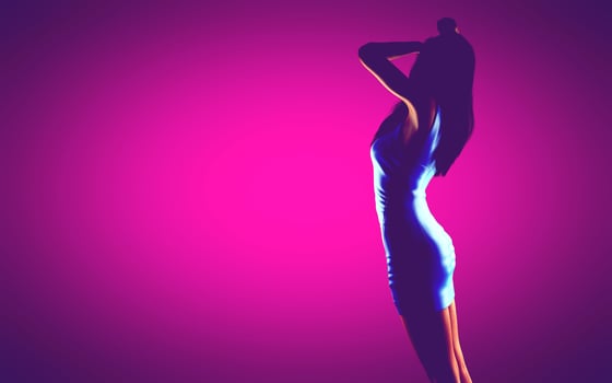 woman in dress at pink background photo