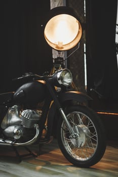 Retro motorcycle in the room photo