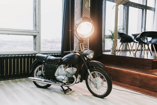 old retro motorcycle in a loft interior photo