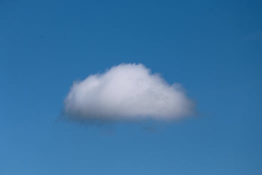 Single nature white cloud on blue sky background in daytime, photo of nature cloud for freedom and nature concept