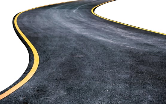 Winding asphalt road with yellow symbol photo