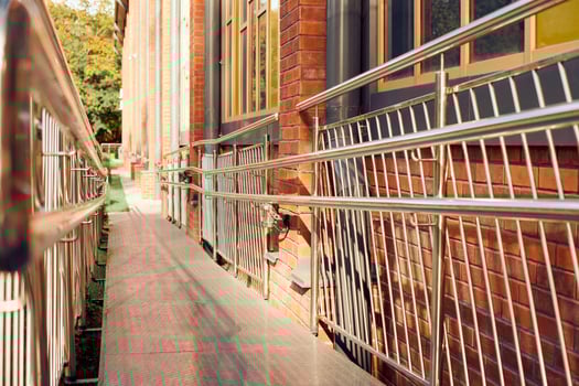 Wheelchair ramp for disabled person, accessible ramp with handrail for disabled people support photo