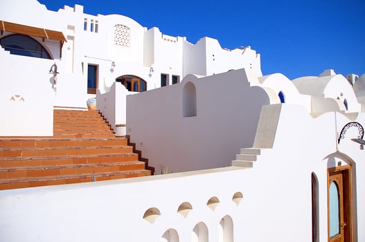 white oriental houses with domes on the sea background photo