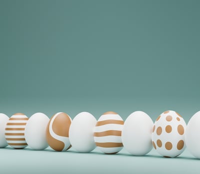 Row of funny easter eggs decorated with different colors and designs. 3D render illustration. Row of Happy Easter eggs in trendy colors on blue background, copy space. 3D rendering photo