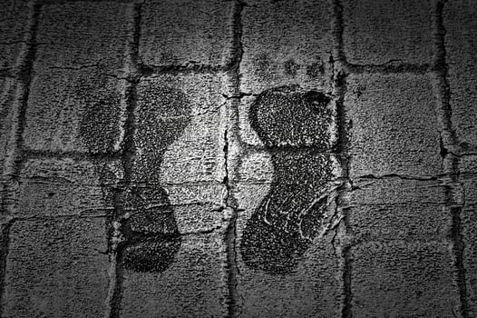 Footprints on zebra crossing photo