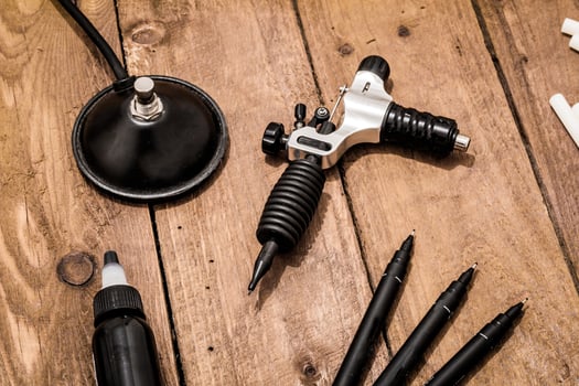 Accessories for tattoo, tattoo artist tools in salon photo