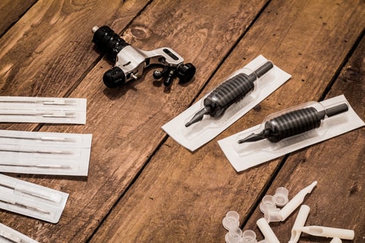 Accessories for tattoo, tattoo artist tools in salon photo