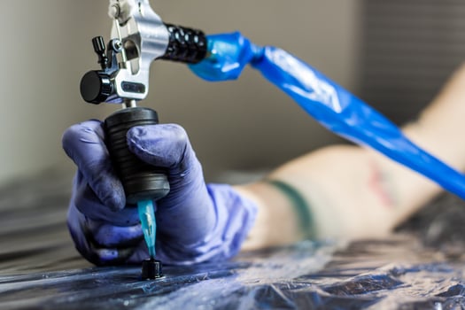 Accessories for tattoo, tattoo artist tools in salon photo