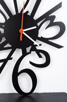 Hands and numbers, fragment of clock. Studio Photo
