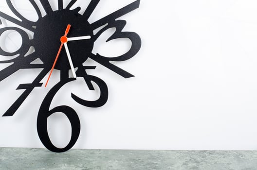 Hands and numbers, fragment of clock. Studio Photo