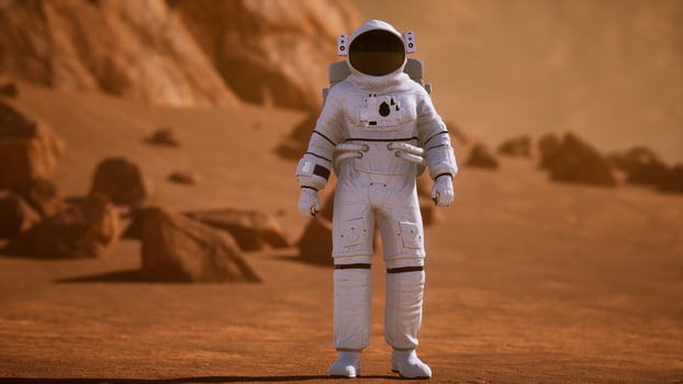 Astronaut on Mars Surface. Red Planet Covered in Gas and rock photo